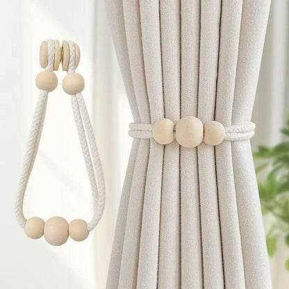 Magnetic curtain tie backs with wooden beads.
