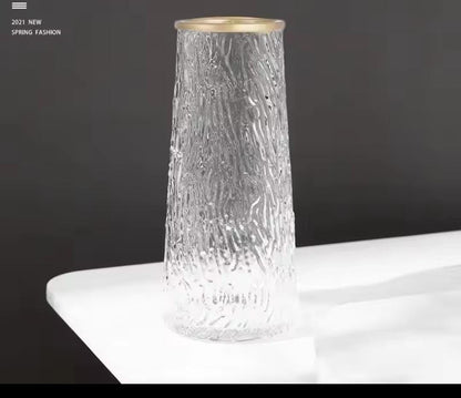 Glass flower vase with Gold rim.