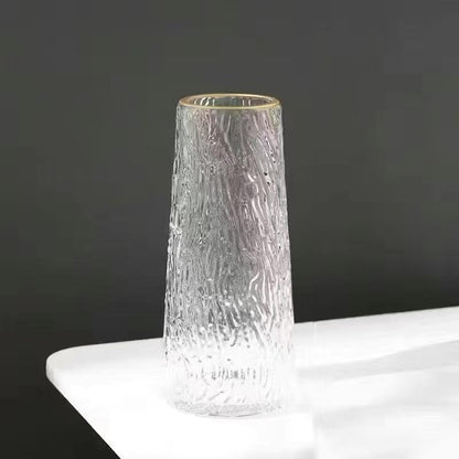 Glass flower vase with Gold rim.