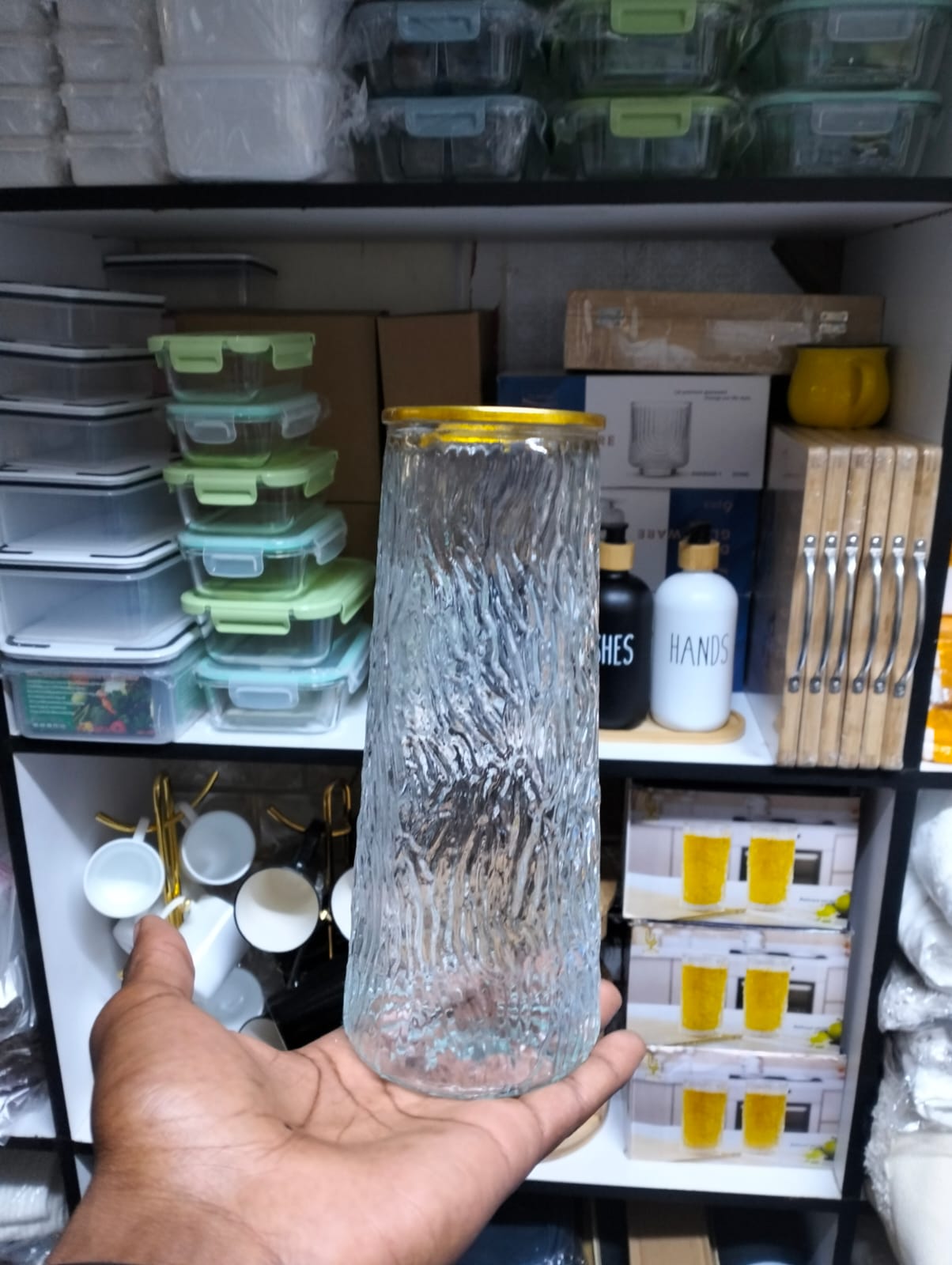 Glass flower vase with Gold rim.