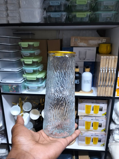 Glass flower vase with Gold rim.