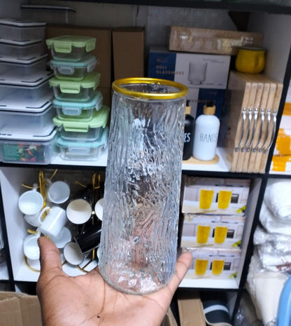 Glass flower vase with Gold rim.